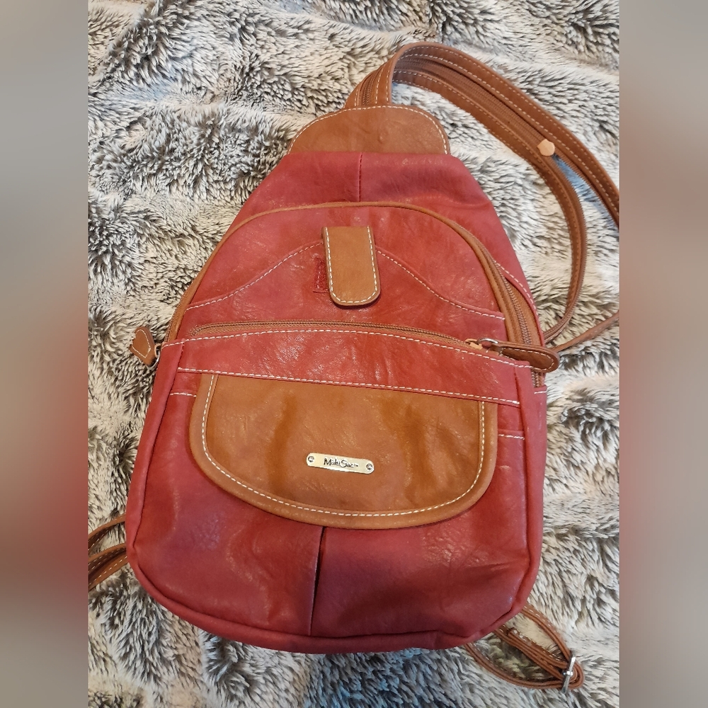 Women’s Red Leather Sling Backpack with Brown Trim